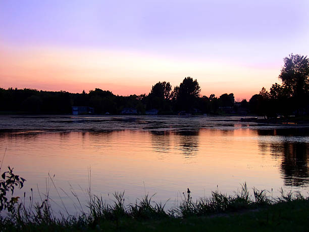 Sunset over a magnificent fishing lake in the Canadian forest