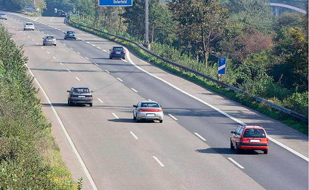 istock highway with cars overtaking 89323054