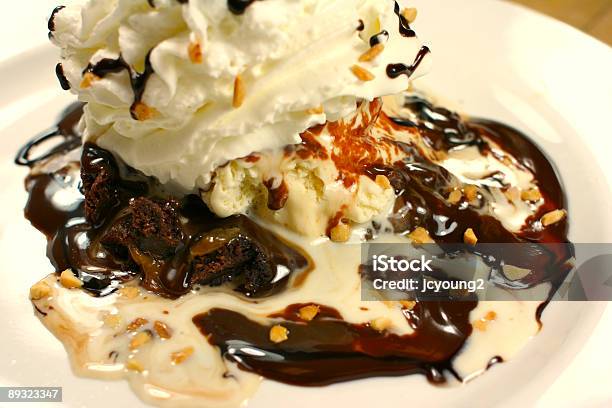 Hot Fudge Sundae With A Brownie Stock Photo - Download Image Now - Brownie, Caramel, Cherry