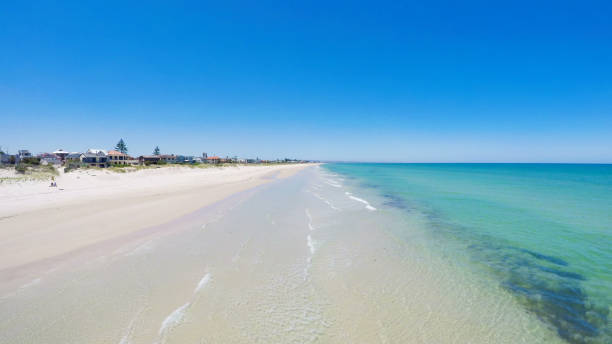 istock Drone aerial view of wide open white sandy beach 893246718