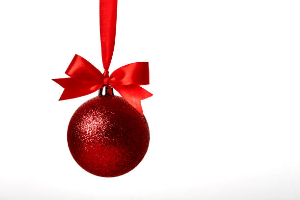 istock Red christmas ball with red bow over white 893262670