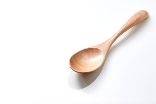 small rustic natural wood spoon - old fashioned domestic kitchen old close up imagens e fotografias de stock