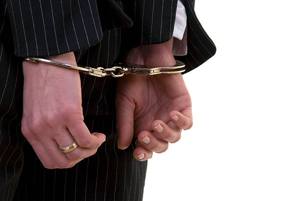 istock Handcuffed business woman 89326380
