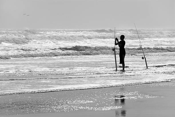 Surf fisherman stock photo