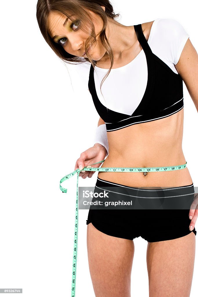 Frau mit Maßband messen Taille - Lizenzfrei Bandmaß Stock-Foto
