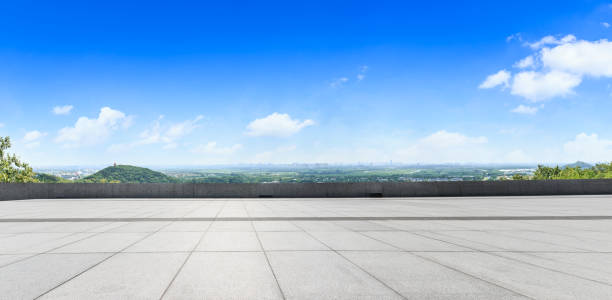 istock Empty city square floor and blue sky nature landscape 893272396