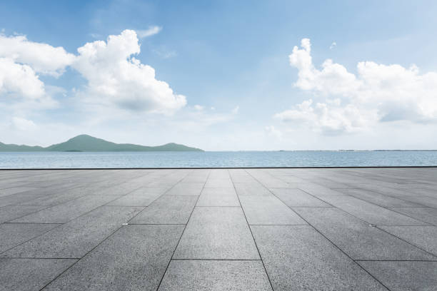 istock Outdoor viewing platform and lake landscape under the blue sky 893279334