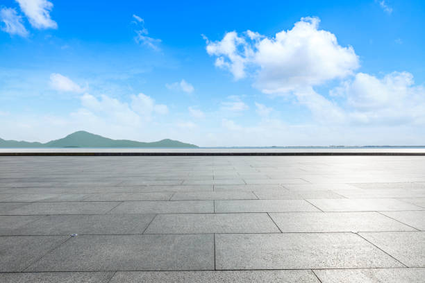 istock Outdoor viewing platform and lake landscape under the blue sky 893281910