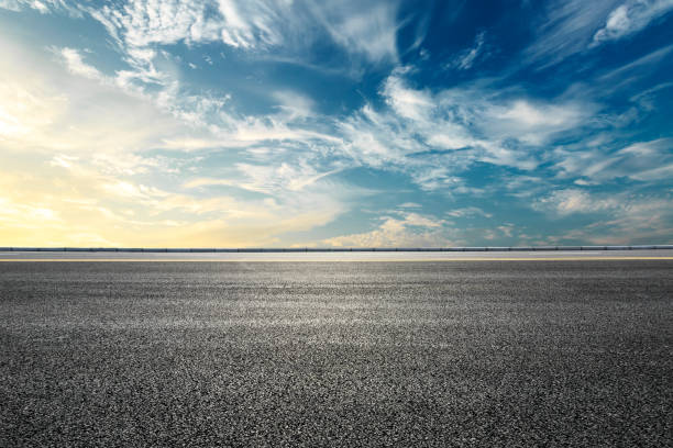 istock Empty highway asphalt road and beautiful sky sunset landscape 893287874