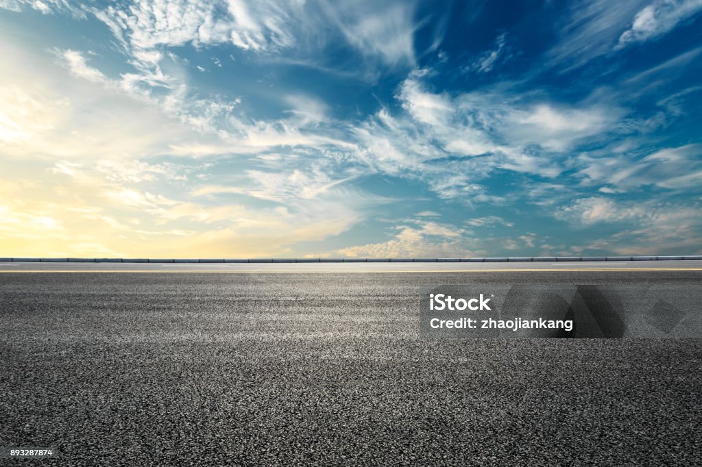 Empty highway asphalt road and beautiful sky sunset landscape Empty highway asphalt road and beautiful sky sunset natural landscape Asphalt Stock Photo