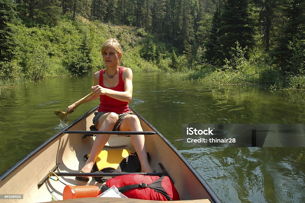 Donna, andare in canoa - Foto stock royalty-free di Abilità