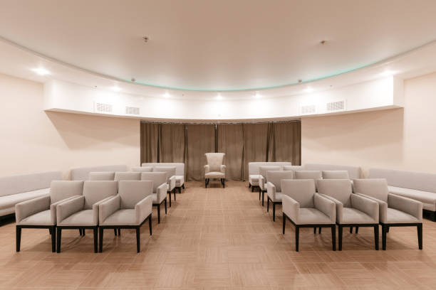 istock Row of chairs in boardroom. seats in an empty conference room 893307904