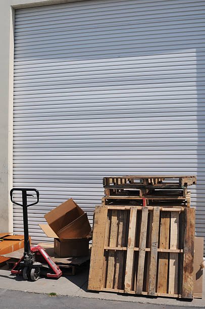 istock Warehouse door and pallettes 89330844