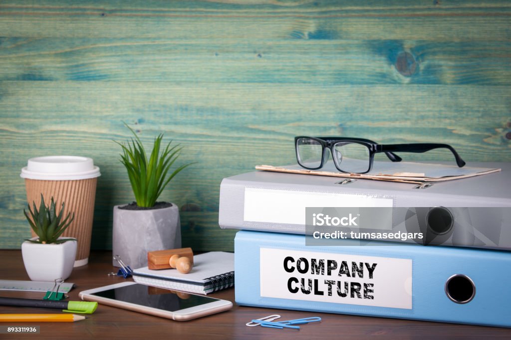 Unternehmenskultur. Bindemittel auf Schreibtisch im Büro. Betriebswirtschaftlicher Hintergrund - Lizenzfrei Kulturen Stock-Foto