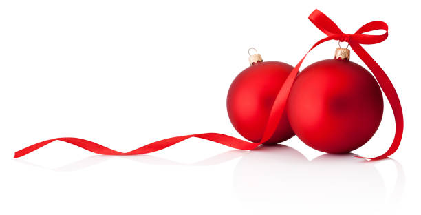 istock Two red Christmas decoration baubles with ribbon bow isolated on white background 893318062