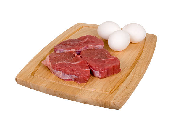 Steak and eggs stock photo