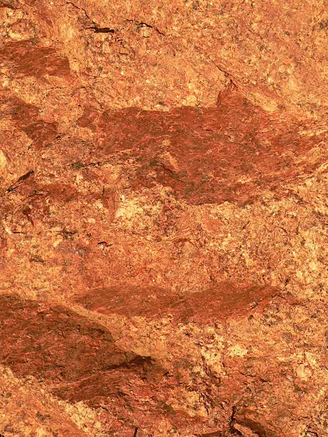 Photo of Macro of red rock with striations