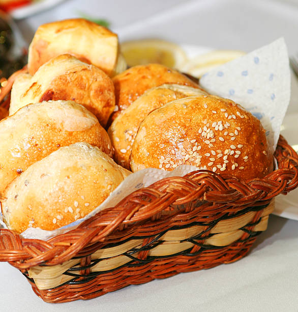Buns in the basket  bread bun corn bread basket stock pictures, royalty-free photos & images