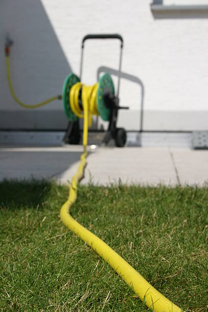 istock Hosepipe on a bobbin - garden hose on drum 89334561