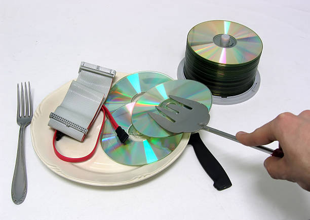Data disc CD served as food stock photo