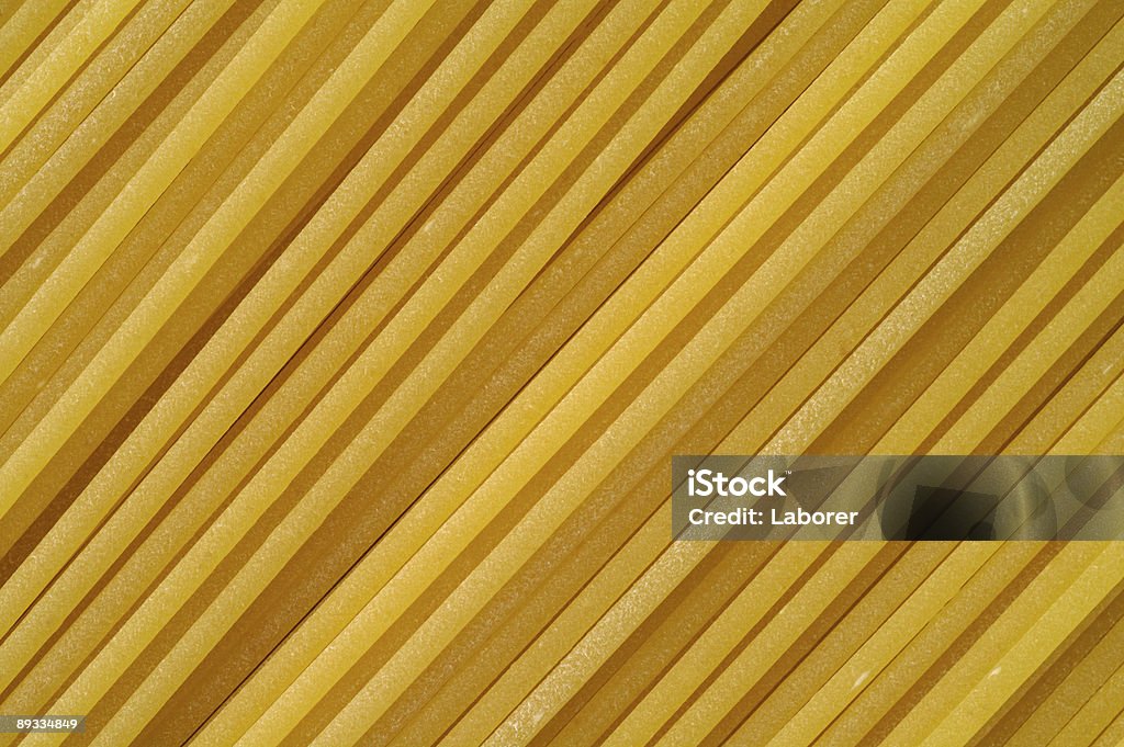 Premium-spaghetti Nahaufnahme Hintergrund - Lizenzfrei Bronze Stock-Foto