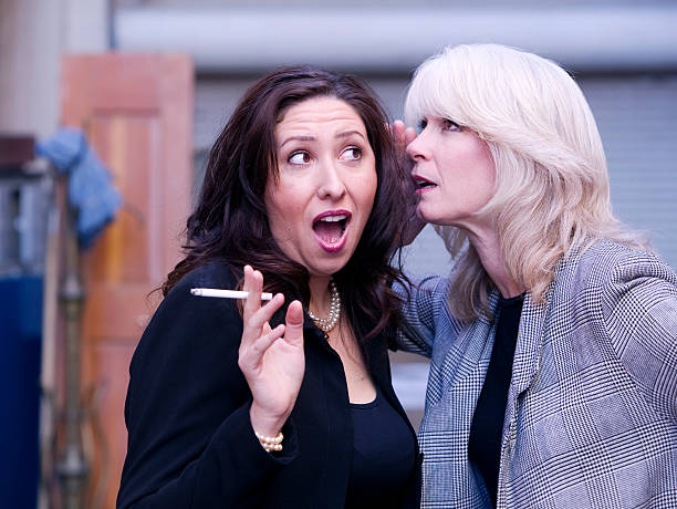 istock Women Gossip During a Smoking Break 89336584