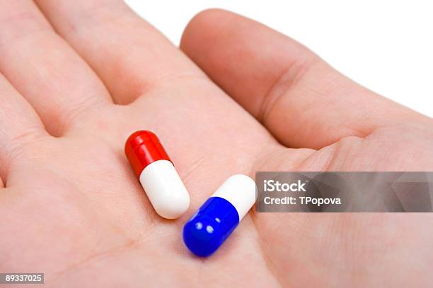 Hand And Pills Stock Photo - Download Image Now - A Helping Hand, Adult, Animal Finger