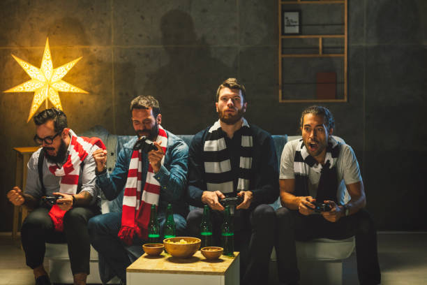 istock Men Socializing at Home - Playing Video Games 893378292