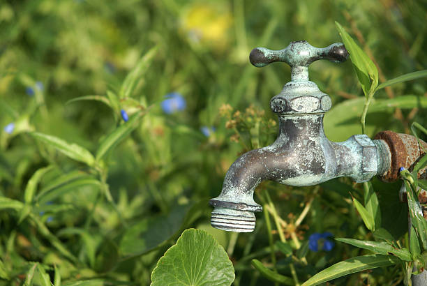 Outdoor faucet stock photo
