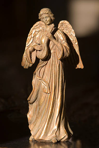istock GOLDEN ANGEL WITH GUITAR 89338815