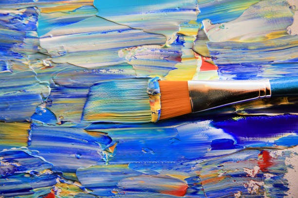 istock Closeup background of brush and palette. 893388952