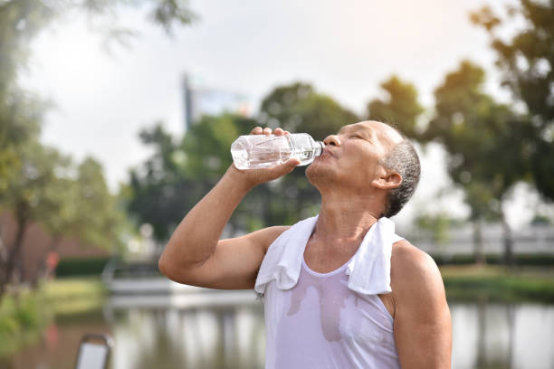 istock Asian senior male drinking water. 893395510