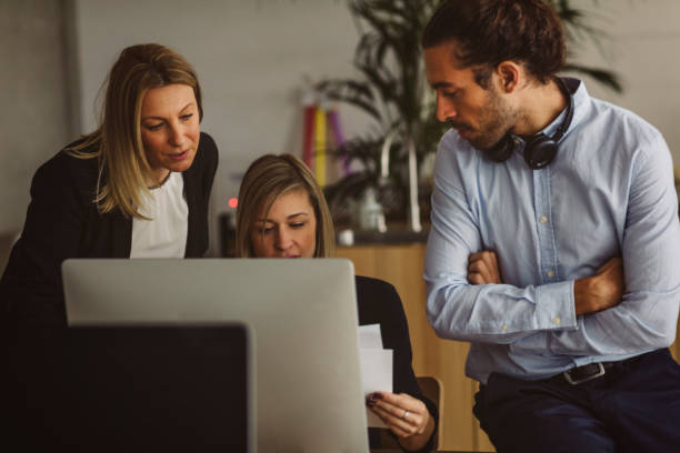 istock Businesspeople Working Together In The Modern Office 893395626