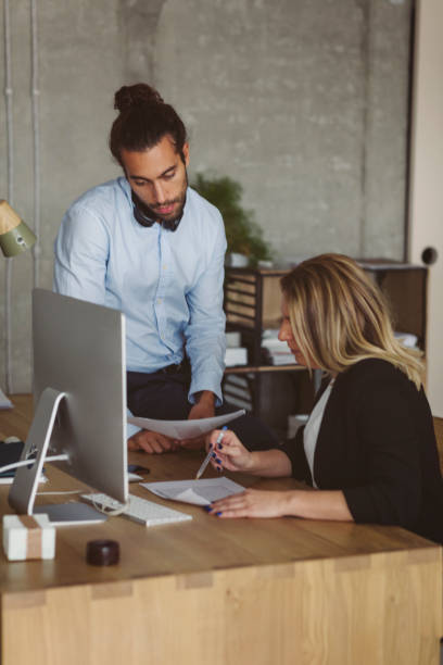istock Businesspeople Working Together In The Modern Office 893395738