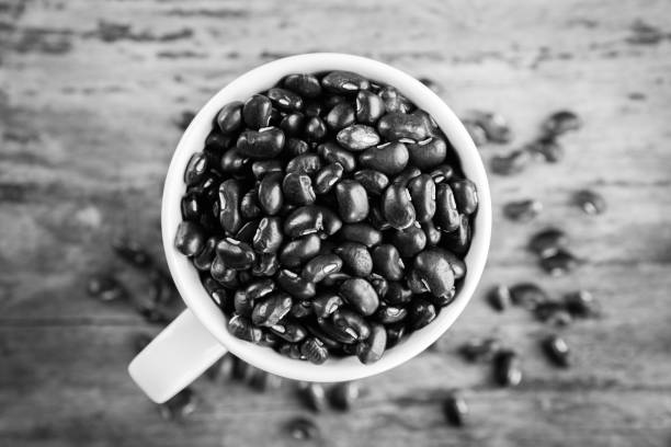 Black beans in cup. Top view.