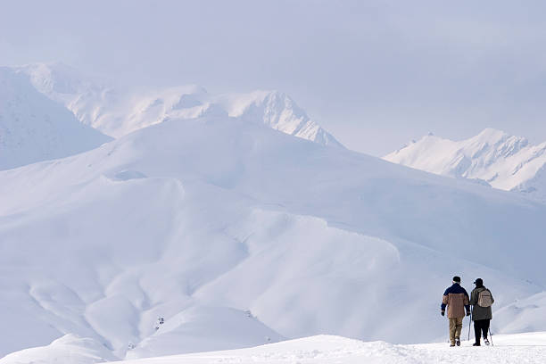 istock walking couple in the Alps 89340604