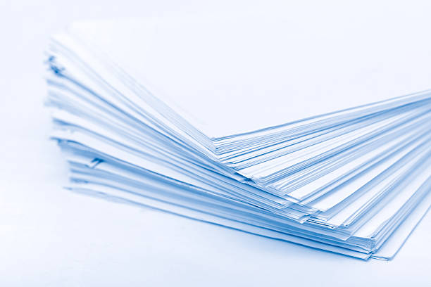 istock Heap of paper blue tint 89340617