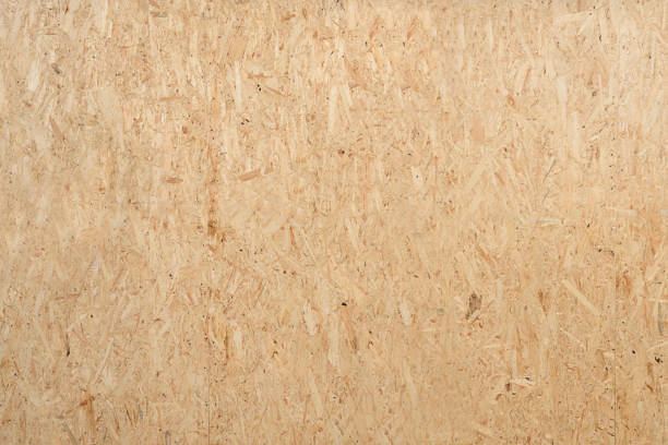 Wooden Background OSB panel with space for your text. plywood stock pictures, royalty-free photos & images