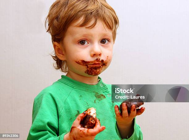 The Boy Eats A Zephyr Stock Photo - Download Image Now - Chocolate, Child, Eating