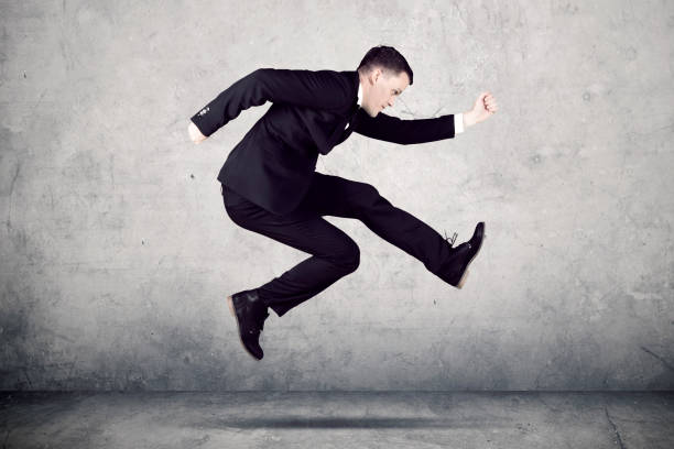 istock American businessman running with fast motion 893424976