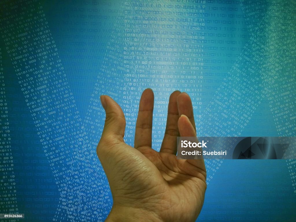 Hand In Front Of Coding On Computer Screen Display Blue Binary Code ...