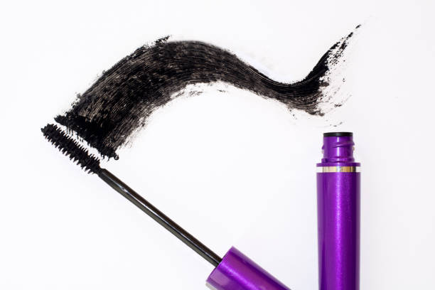 cosmetic black mascara, volume brush isolated on white background