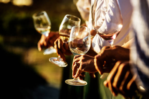 Closeup of wine glasses during a celebration stock photo