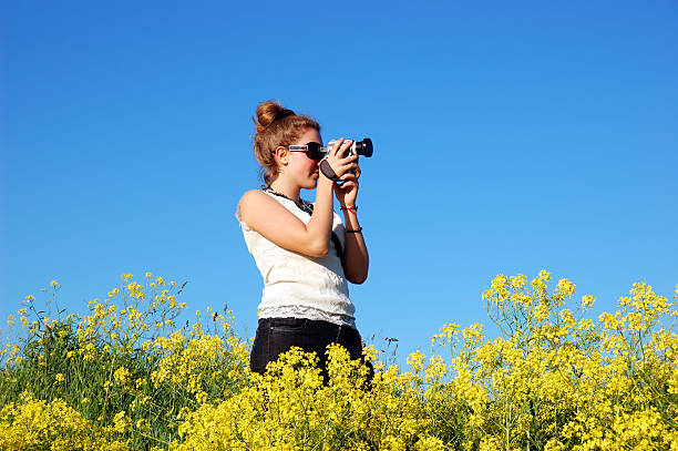 istock Beautiful girl with camera 89343385