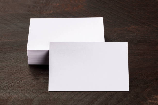 istock Photo mockup of blank white business card with stack 893434064