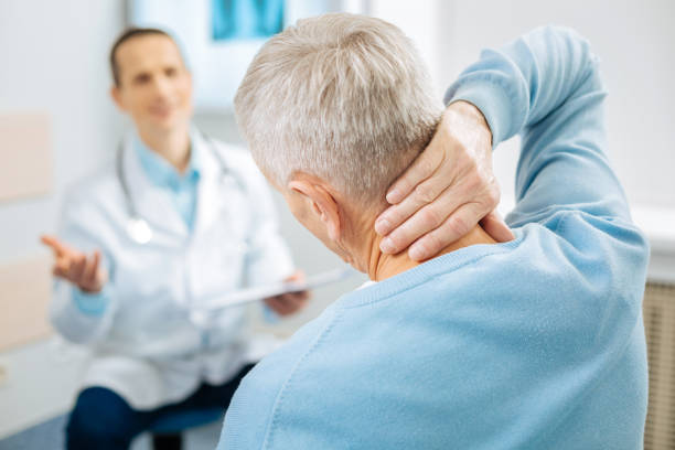 istock Nice aged man feeling pain in the neck 893442660