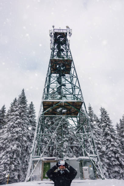 istock Early winter morning with snow and VR glasses 893450784