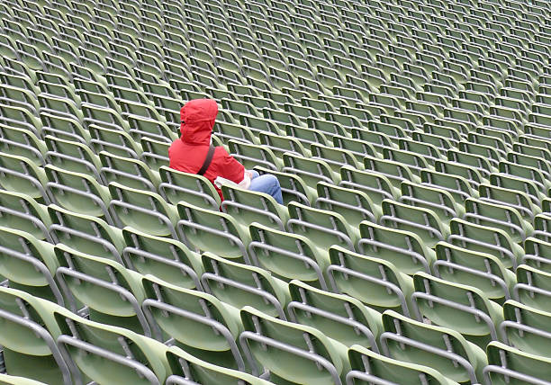 одинокие женщины - american football stadium bleachers education stadium стоковые фото и изображения