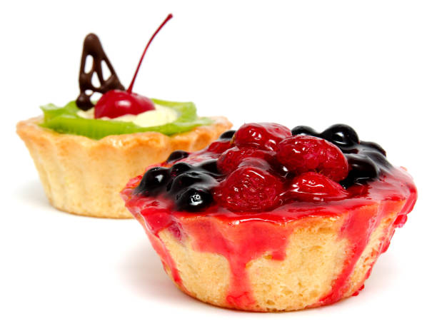 istock Delicious cakes pastry with fruit raspberry currant kiwi isolated 893460630