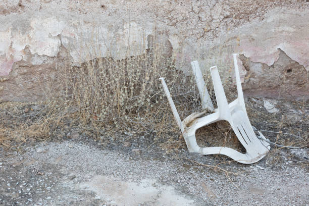 Abandoned house in Greece - Slowly turning into a pile of stones - Abandoned plastic chair